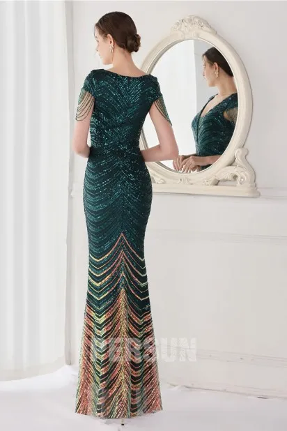 Green sequin mermaid wedding dress with fringed cap sleeves.