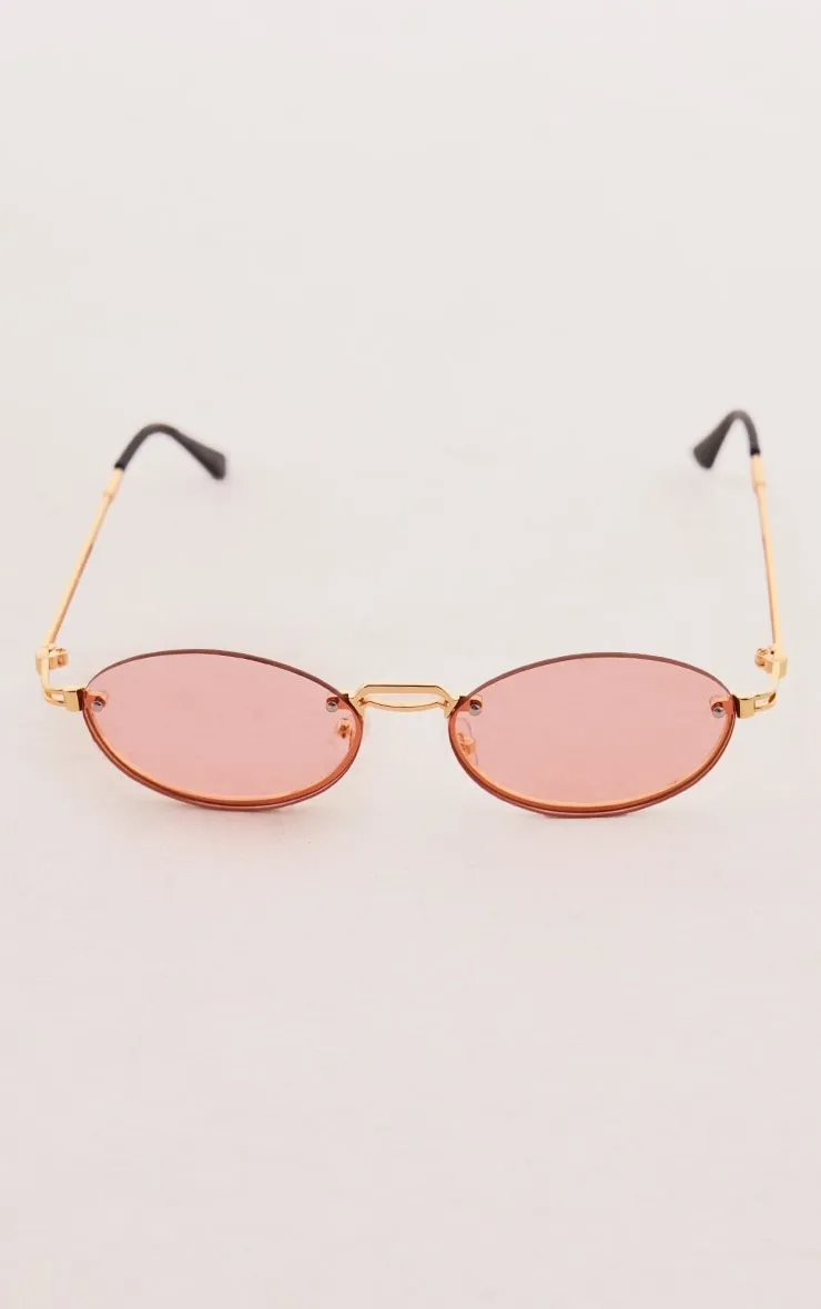 Pink round slim curved sunglasses.