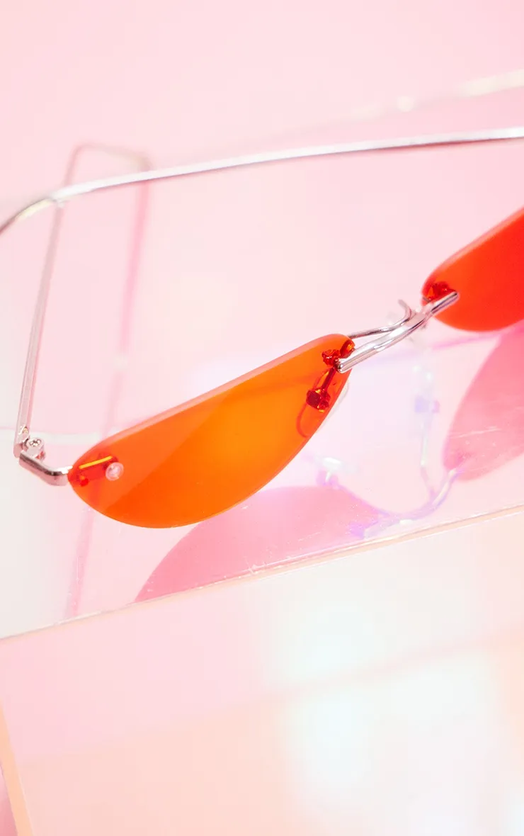 Red thin frame sunglasses.