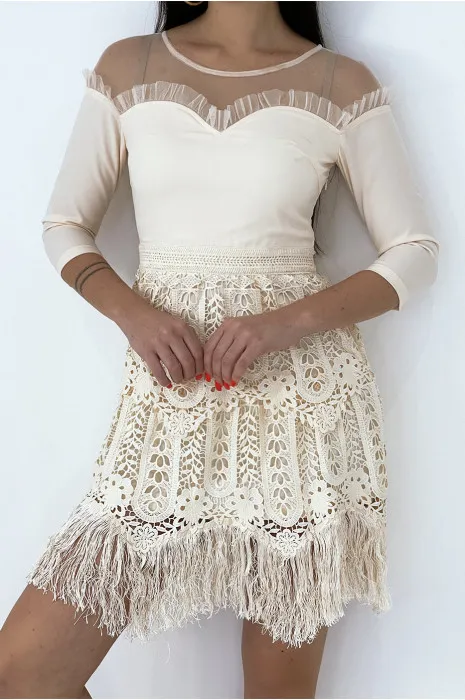 Pale pink chic dress with 3/4 sleeves and fringed cutout lining.