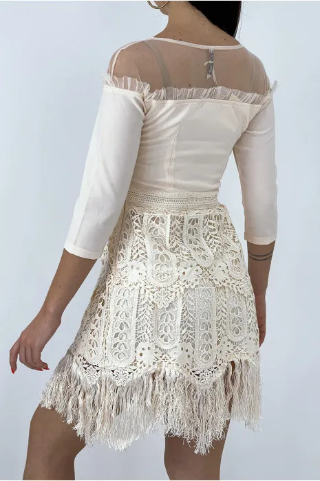 Pale pink chic dress with 3/4 sleeves and fringed cutout lining.