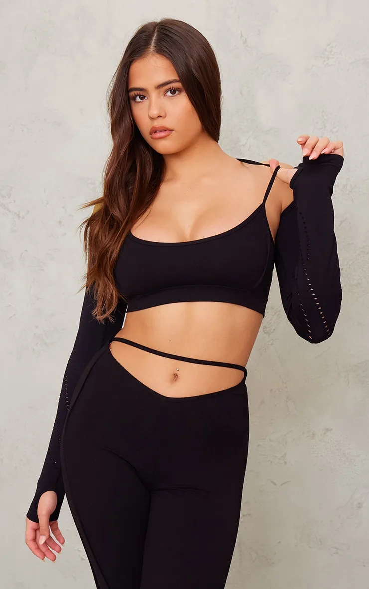 Black seamless laser cut yoga crop top from PLT Sport