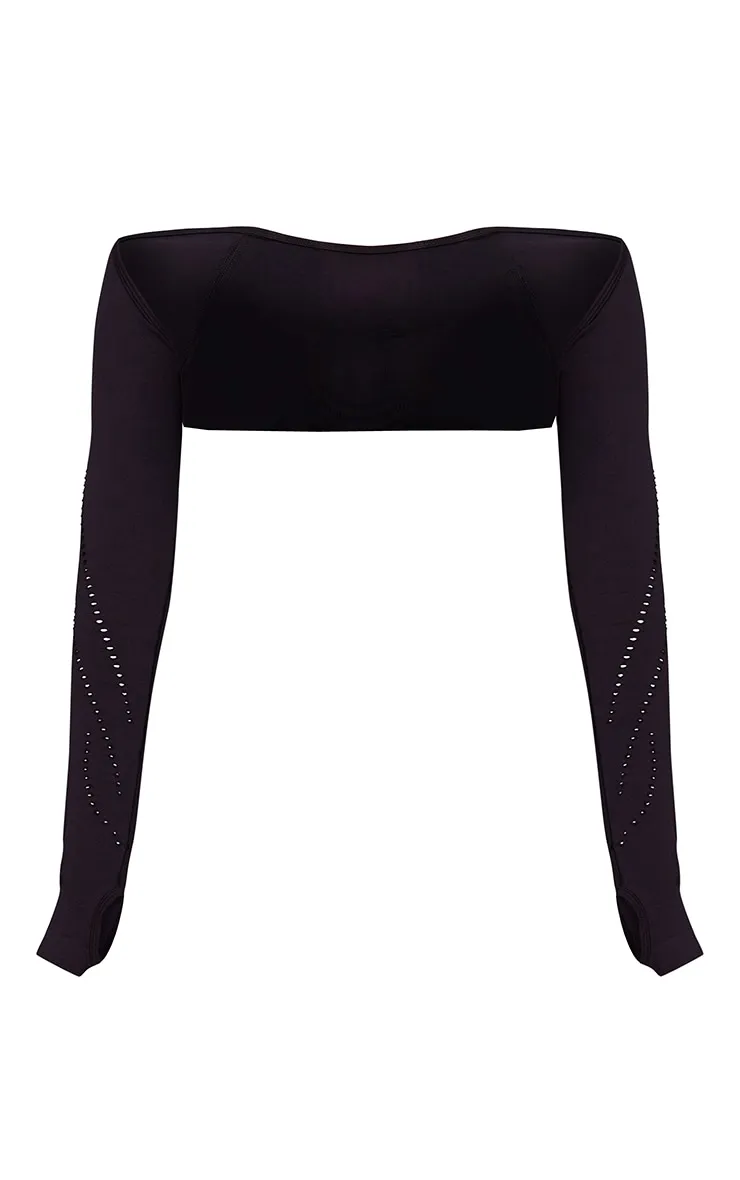 Black seamless laser cut yoga crop top from PLT Sport