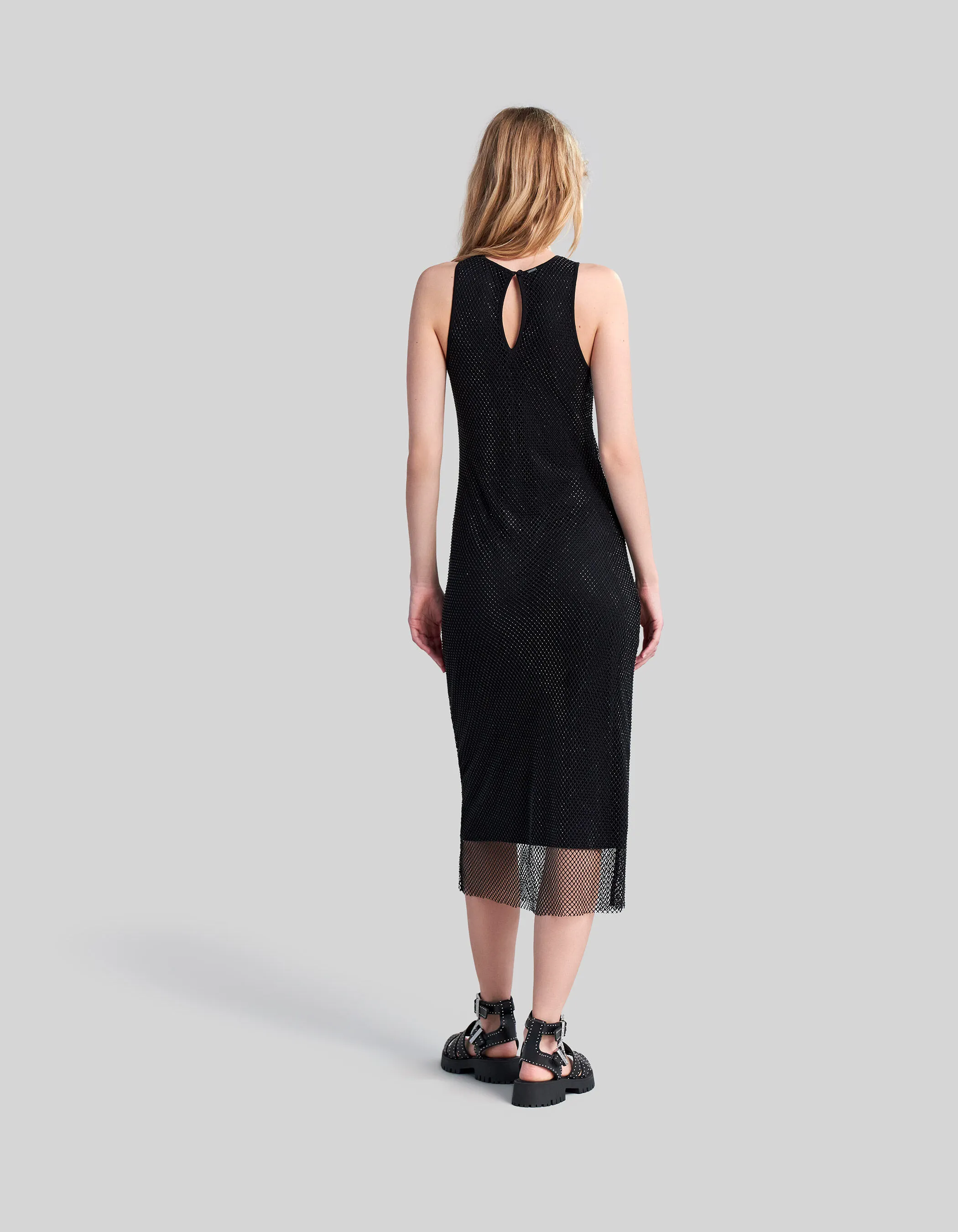 Black midi dress with mesh and rhinestone detail and sheer lining for women.