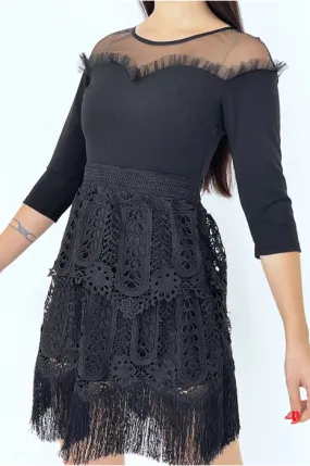 Stylish black dress with 3/4 sleeves and fringed cutout lining.