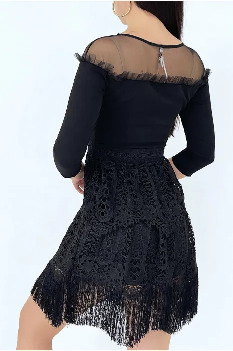 Stylish black dress with 3/4 sleeves and fringed cutout lining.