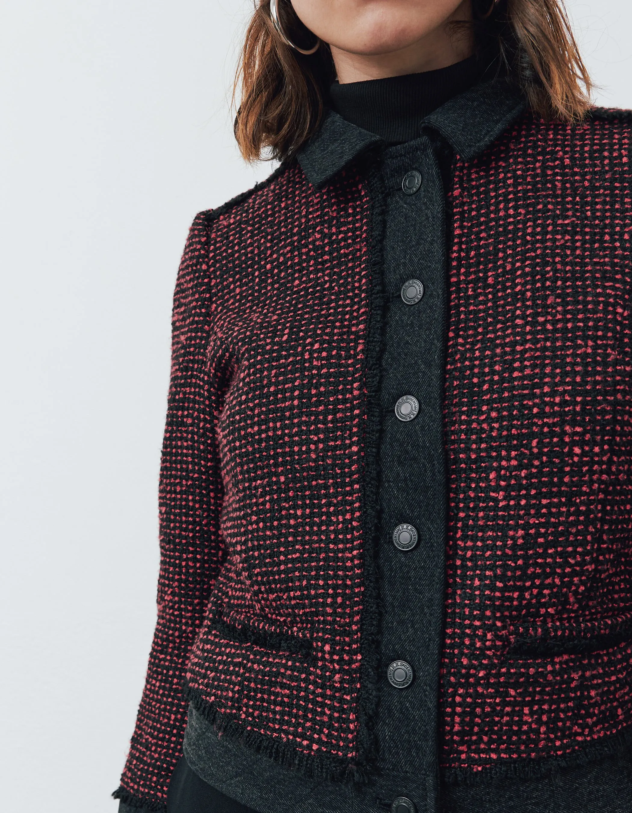 Red and black tweed and denim women's two-tone jacket.