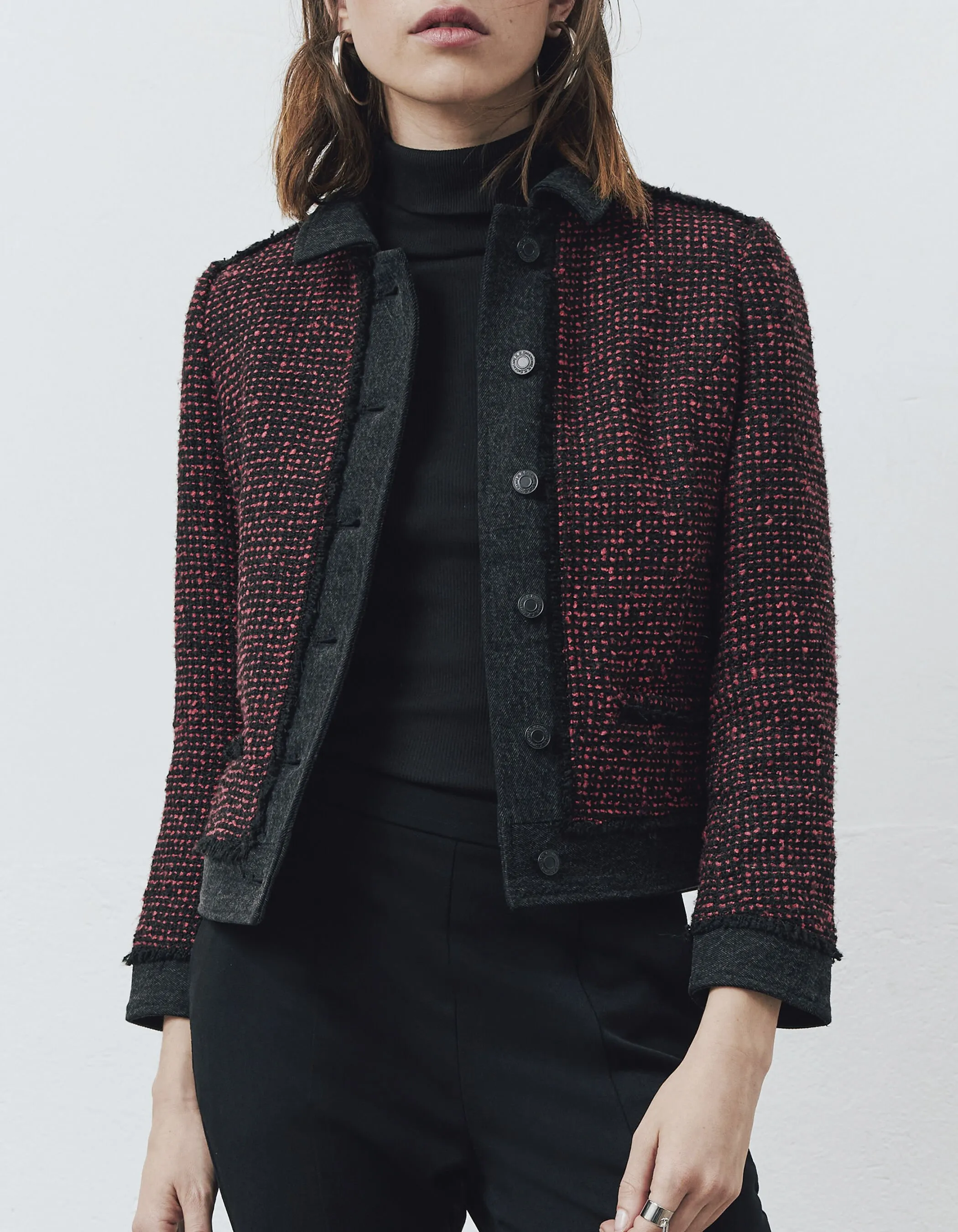 Red and black tweed and denim women's two-tone jacket.