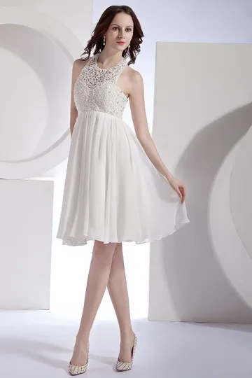 White evening dress with cutout hem.